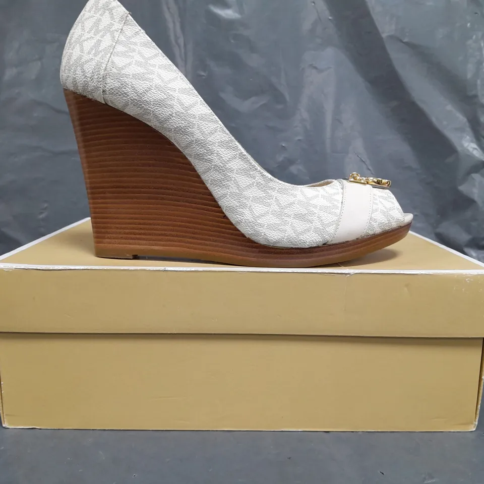 BOXED PAIR OF MICHAEL KORS HAMILTON WEDGE SHOES IN CREAM SIZE EU 41