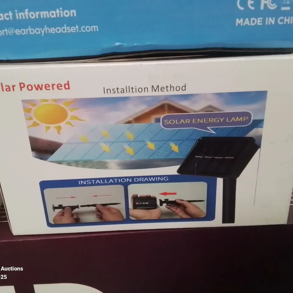 BOX CONTAINING LARGE AMOUNT OF BOXED ELECTRICAL ITEMS TO INCLUDE: PHONE CASES, HEADPHONES, LIGHT BULBS, PREMIUM PODCAST SET UP, KARAOKE MIC AND LOTS MORE.