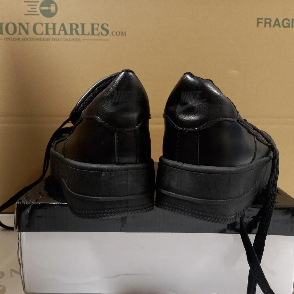 BOXED PAIR OF DESIGNER BLACK FLATFORM TRAINERS - SIZE 7.5