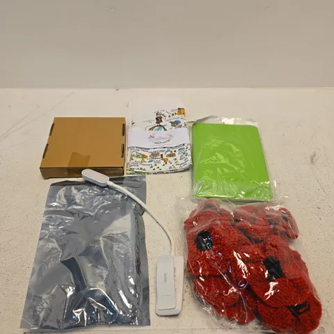 APPROXIMATELY 15 ASSORTED ITEMS INCLUDING A TABLET CASE, THE CAIRNGORMS NATIONAL PARK TEA TOWEL AND GRITIN LED BOOK LIGHT