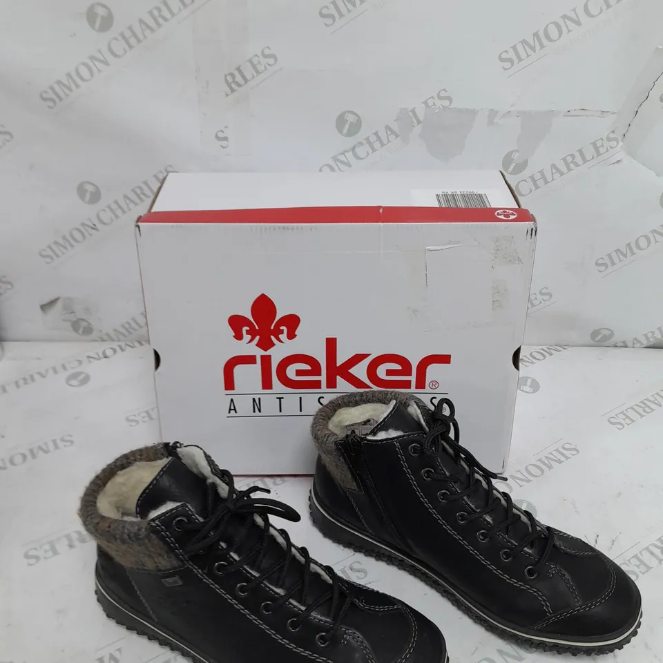 BOXED PAIR OF RIEKER LACE UP BOOTS IN BLACK SIZE 6