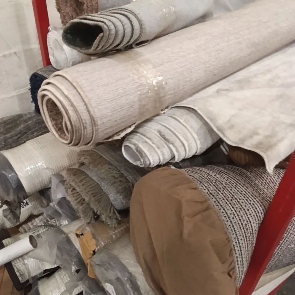 STILLAGE OF DESIGNER RUGS APPROXIMATELY 16 RUGS MEDIUM / LARGE