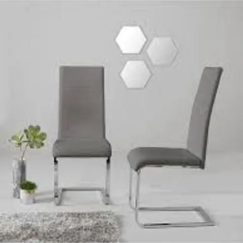 BOXED PAIR OF JET FAUX LEATHER CANTILEVER CHAIRS - MID GREY