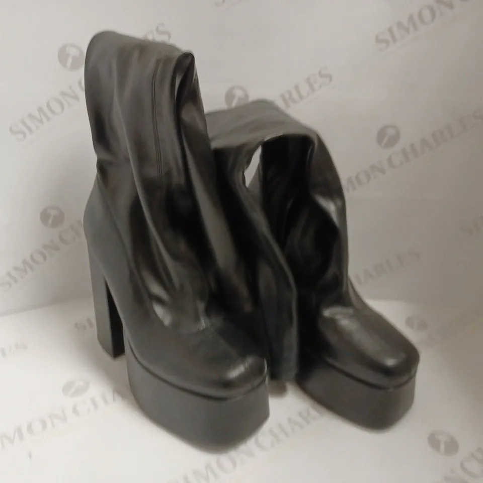 KOI VEGAN RESTLESS RISER STRETCH BLACK PLATFORM LONG BOOTS - SIZE 4