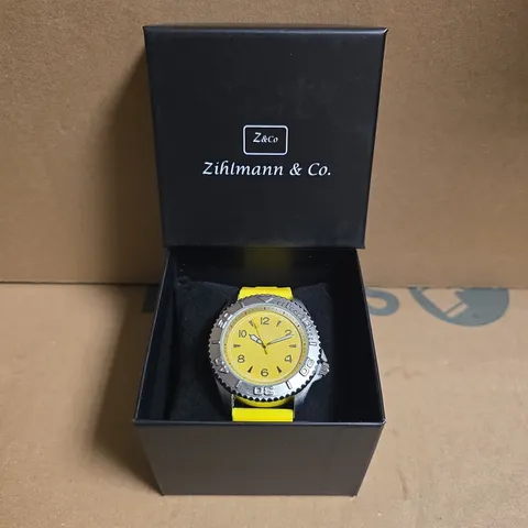ZIHLMANN & CO STAINLESS STEEL WATCH WITH YELLOW FACE & RUBBER STRAP