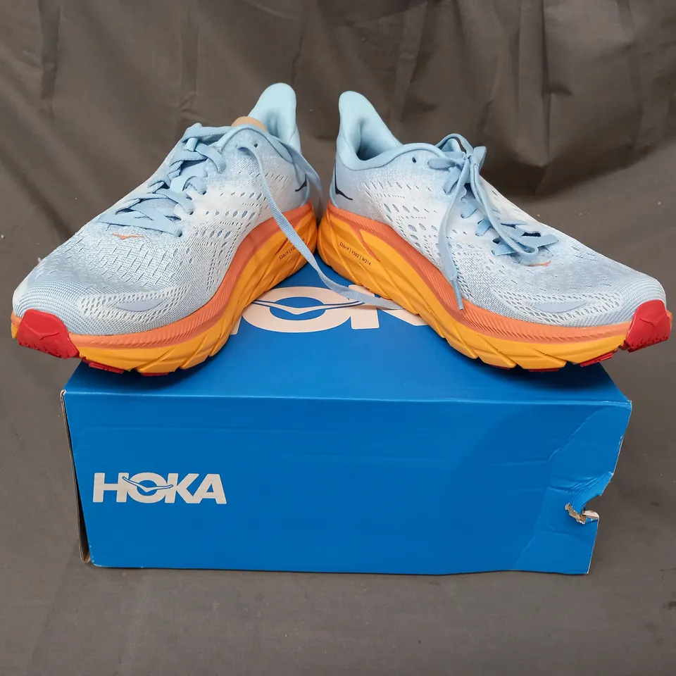 BOXED PAIR OF HOKA CLIFTON 8 SHOES IN LIGHT BLUE/ORANGE UK SIZE 7.5