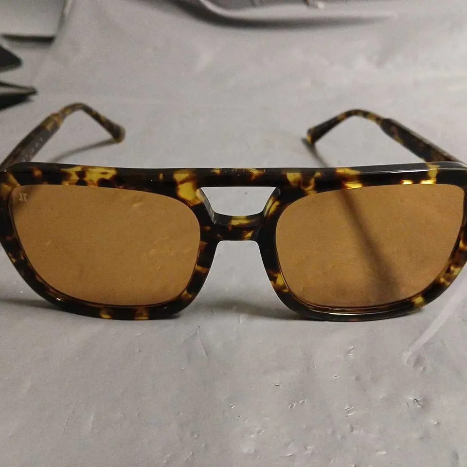 PAIR OF JIMMY FAIRLY BROWN PATTERENED GLASSES