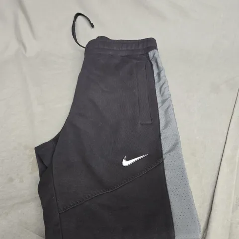 NIKE LOGO FLEECED TRACKSUIT BOTTOMS SIZE M