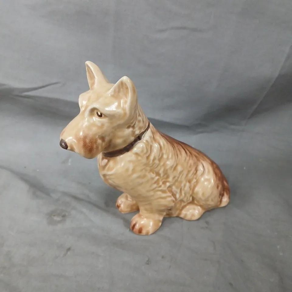 CERAMIC DOG FIGURINE, SEATED WITH BEIGE GLAZE AND BROWN SHADING