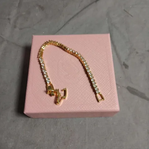 SWAROVSKI CRYSTAL BRACELET – GOLD-TONE WITH CLEAR STONES