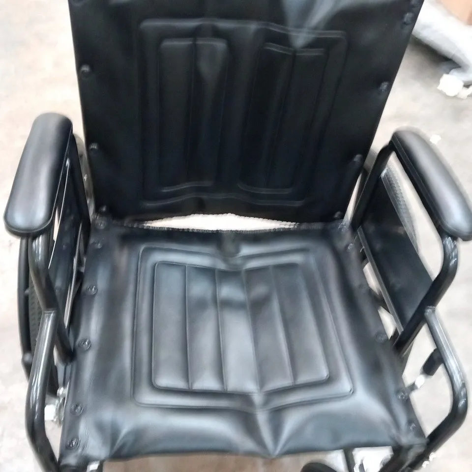 BLACK LEATHER WHEEL CHAIR WITH HAND BREAKS 