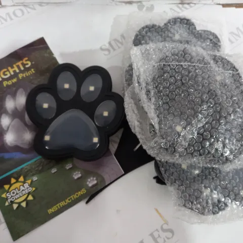BOXED BELL AND HOWELL SET OF 4 SOLAR PAW LIGHTS