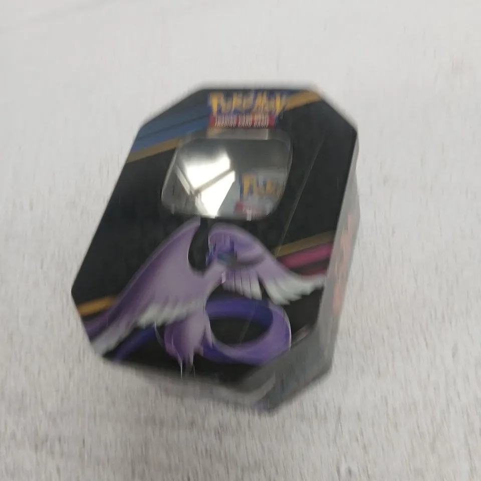 POKÉMON TRADING CARD TIN WITH ASSORTED CARDS AND PHANTOM FLAMES BOOSTER PACK