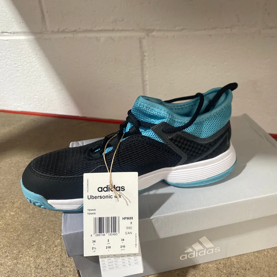 BOXED PIR OF UBERSONIC 4K TRAINERS SIZE 2