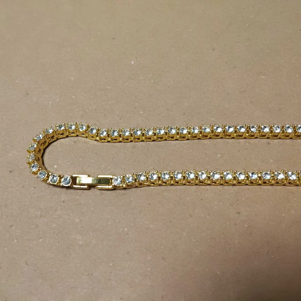 GOLD TONE TENNIS CHAIN WITH STONES