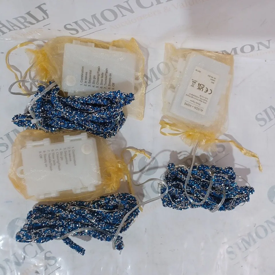 boxed ALISON CORK INDOOR/OUTDOOR PRE-LIT GLITTER ROPE STRANDS