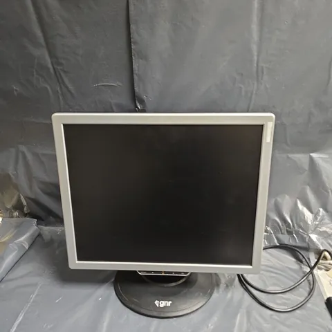 GNR COMPUTER MONITOR – BLACK BEZEL WITH SILVER TRIM ON CIRCULAR STAND .