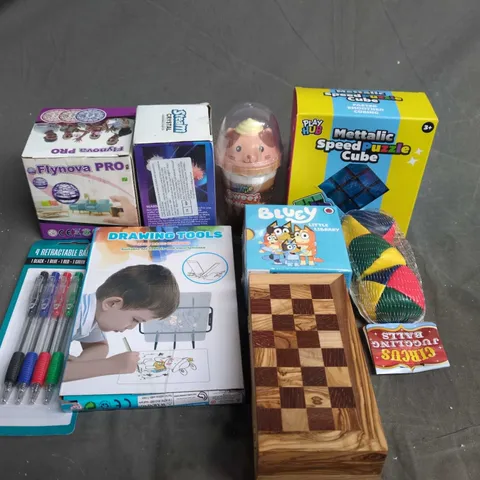 APPROXIMATELY 10 ASSORTED TOYS & GAMES PRODUCTS TO INCLUDE RUBIKS CUBE, DRAWING TOOLS AND JUGGLING BALLS