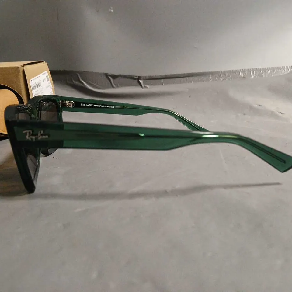 BOXED PAIR OF RAYBAN CLEAR GREEN FRAMED GLASSES