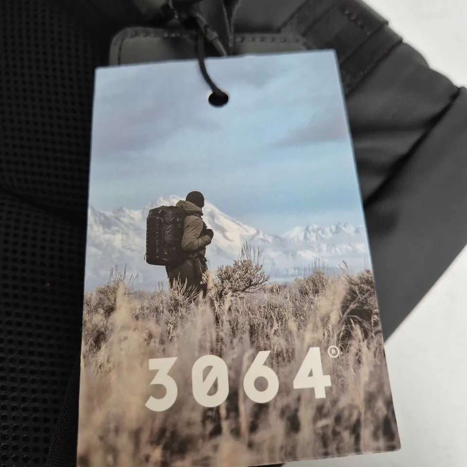 BLACK RUCKSACK WITH MULTIPLE EXTERIOR STRAPS – TAG 3064 