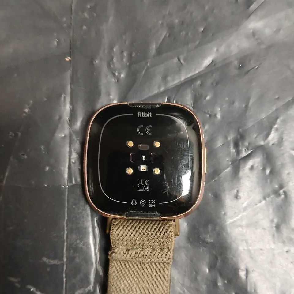 FITBIT SMARTWATCH WITH KHAKI FABRIC STRAP – ROSE GOLD CASE