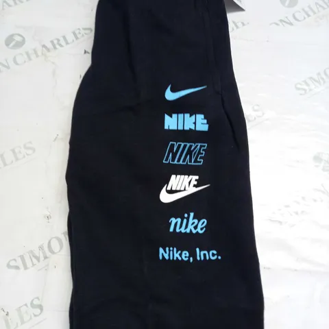 NIKE LOGO PRINT TRACKSUIT BOTTOMS SIZE 6-7 YEARS