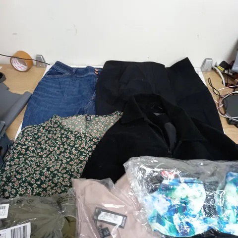 LARGE BOX OF ASSORTED CLOTHING ITEMS IN VARIOUS COLOURS AND SIZES INCLUDING TROUSERS , TOPS AND JUMPERS