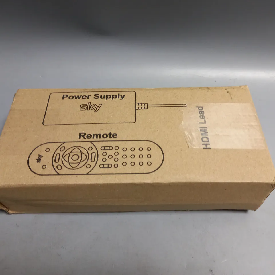 BOXED SKY REMOTE AND POWER SUPPLY
