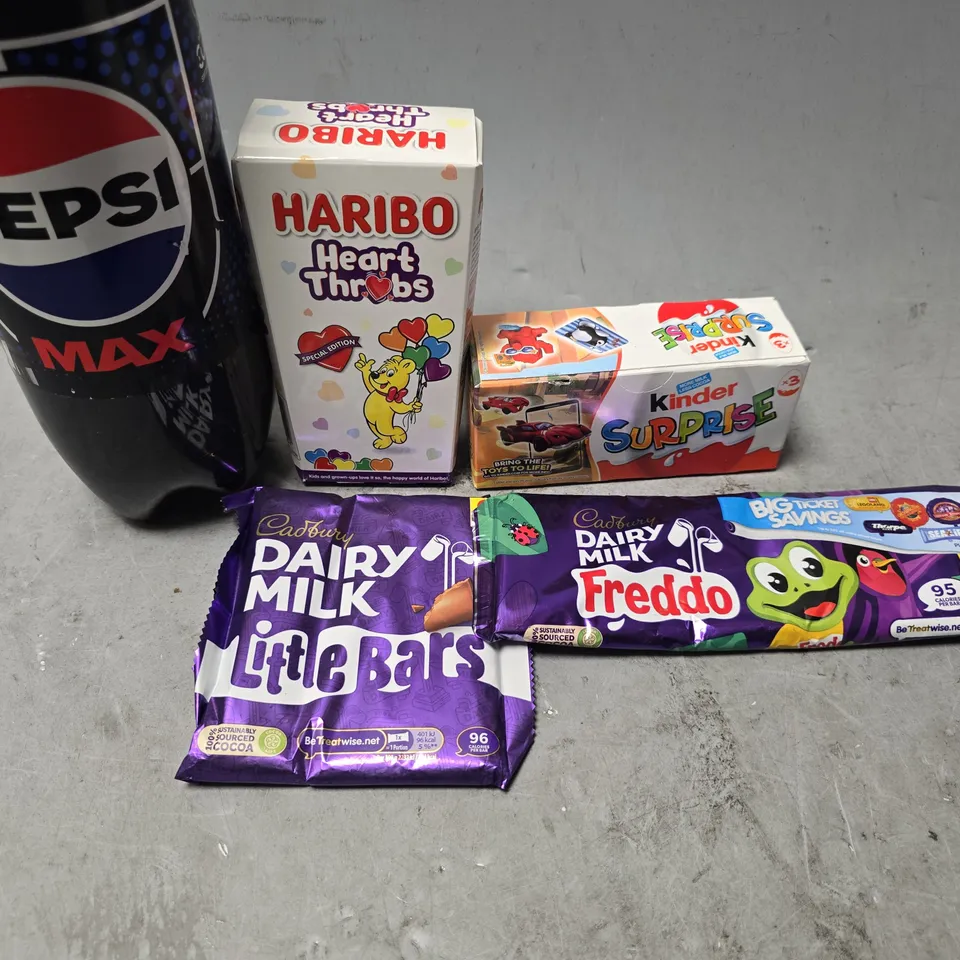 APPROXIMATELY 7 ASSORTED FOOD & DRINK ITEMS TO INCLUDE - PEPSI MAX , CADBURY DAIRY MILK , HARIBO HEARTS ETC