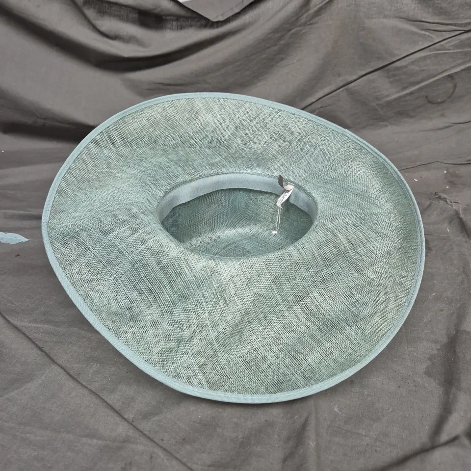 WOMEN'S PALE BLUE-GREEN WOVEN SUN HAT WITH WIDE BRIM AND FLORAL CENTERPIECE