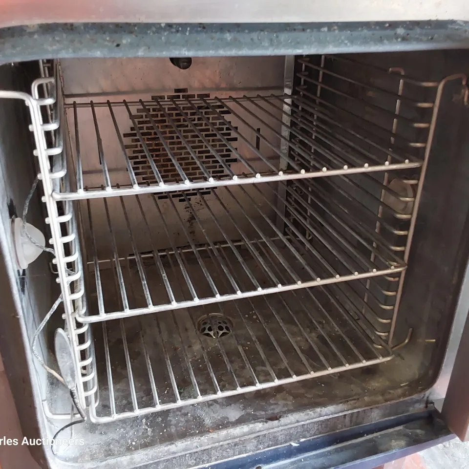 ELOMA JOKER T COMPACT ELECTRIC COMBI OVEN ON RACKED STAND