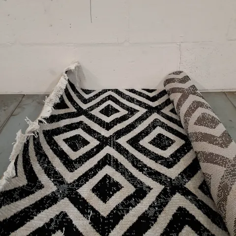 BRAND NEW PACO HOME 821 BLACK AND WHITE POCO RUG SIZE 80CM X 150CM