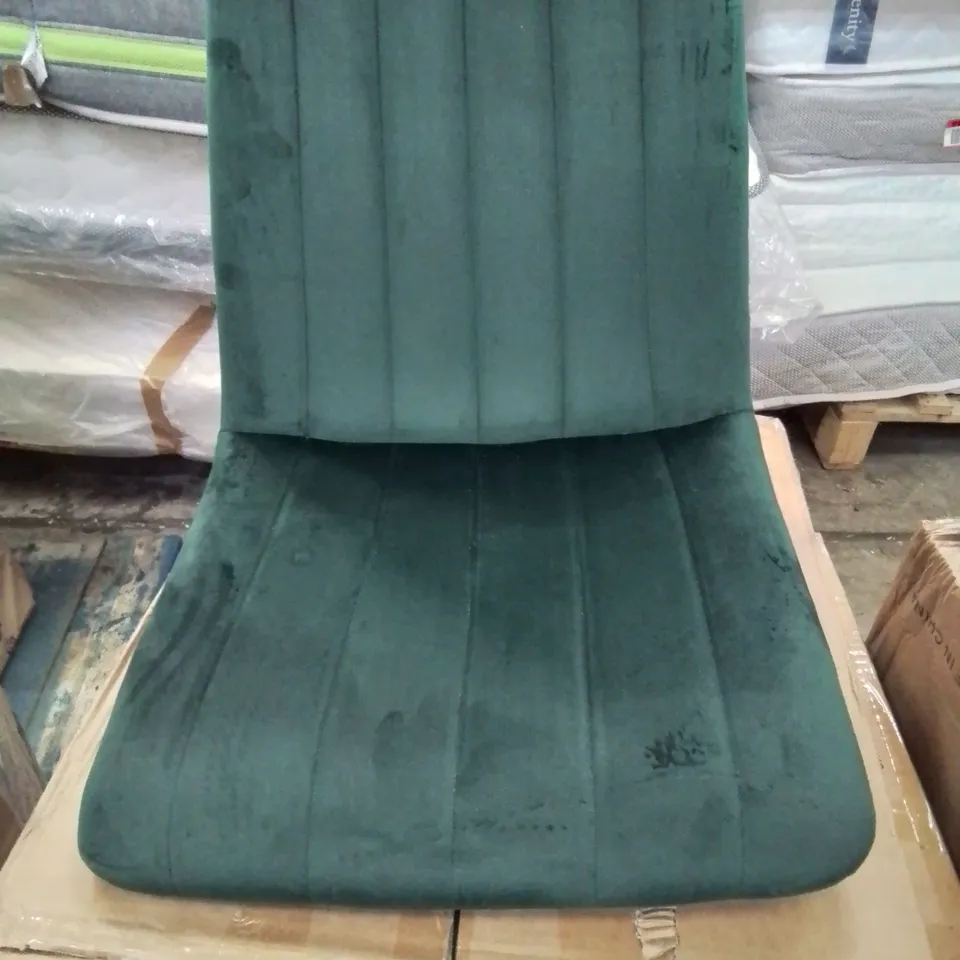 A BOXED PAIR OF DARK GREEN VELVET UPHOLSTERED SIDE/DINING CHAIRS