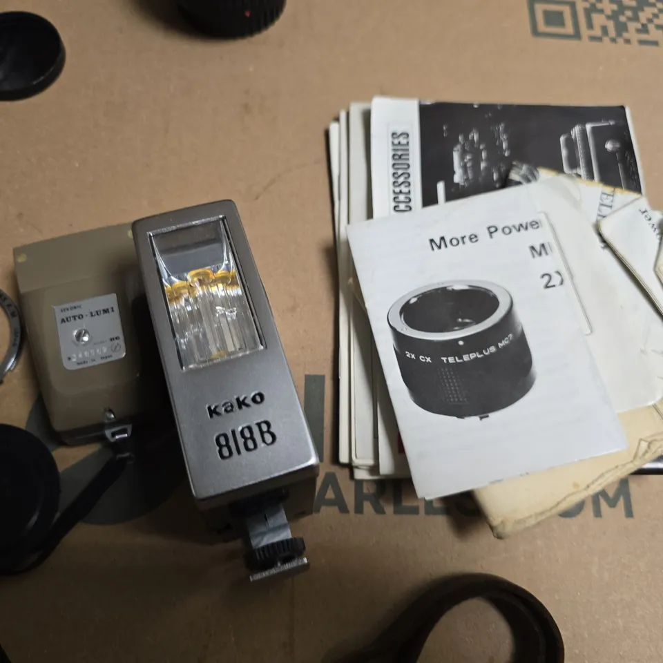 Vintage camera accessories bundle: Kako 818B flash, 2x Teleplus MC teleconverter, Vivitar/Canon lens caps & mounts