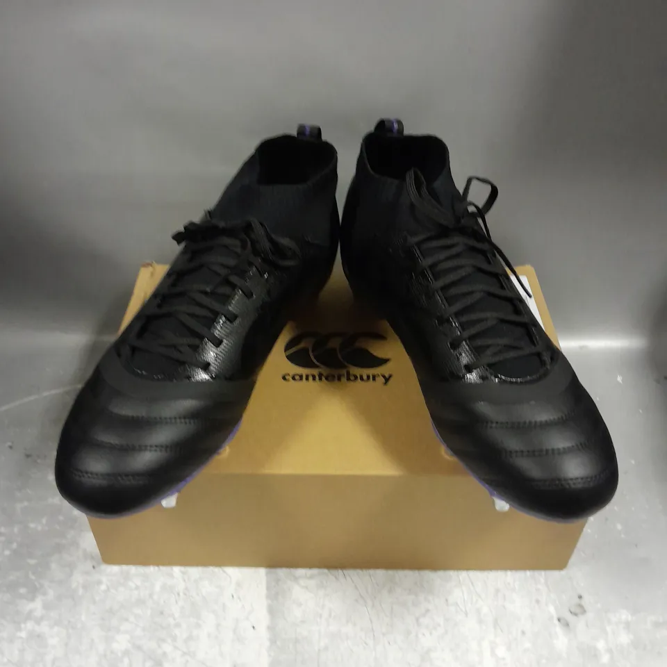 BOXED PAIR OF CANTERBURY STAMPEDE PRO SG AU RUGBY BOOTS IN BLACK/PURPLE SIZE UK 12