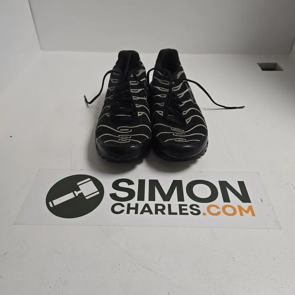 UNBOXED PAIR OF NIKE AIR MAX PLUS TN SNEAKERS IN A BLACK AND REFLECTIVE SILVER COLORWAY - UK 11.5