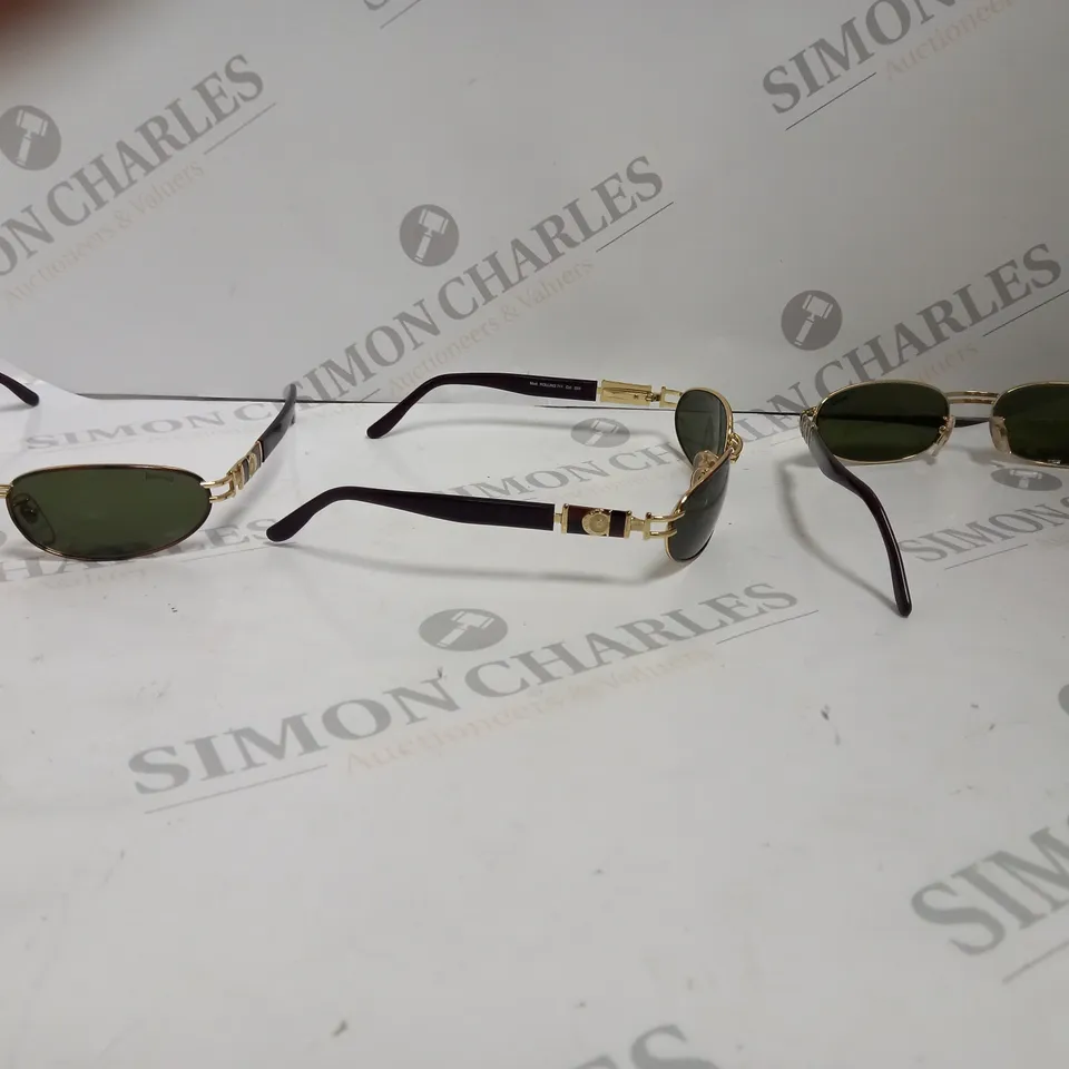 BOX OF APPROX 8 PAIRS OF ROLLING 711 SUNGLASSES.