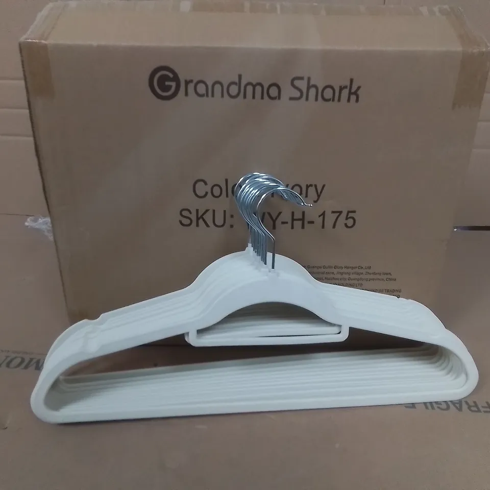 APPROXIMATELY 50 GRANDMA SHARK HANGERS IN IVORY WY-H-175 