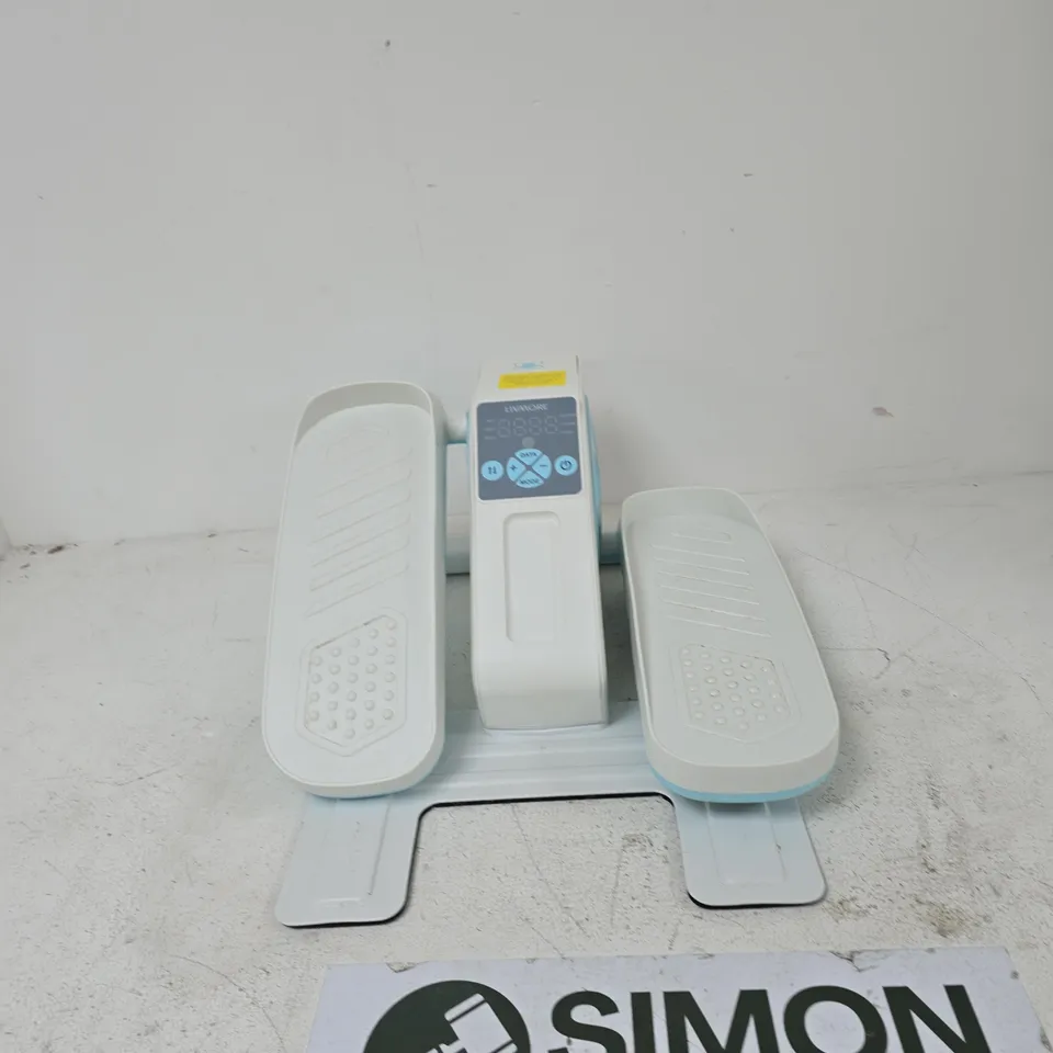 WHITE ELLIPTICAL MACHINE