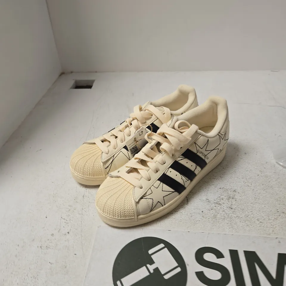 ADIDAS SUPERSTAR TRAINERS – CREAM/OFF-WHITE WITH BLACK STRIPES UK 7.5