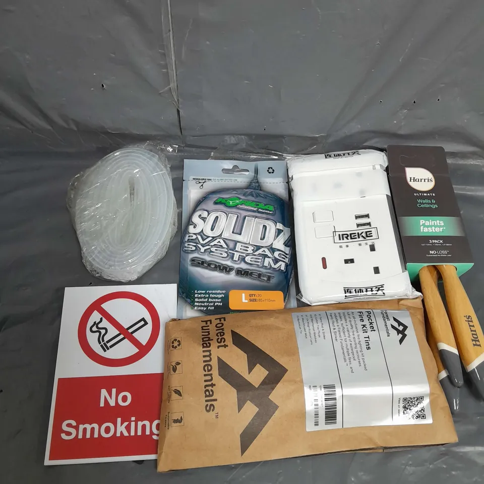 TOTE OF APPROX 10 HOUSEHOLD ITEMS TOO INCLUDE PLUGS , SAFETY SIGNS , FIRE KIT TINS  , ETC. 