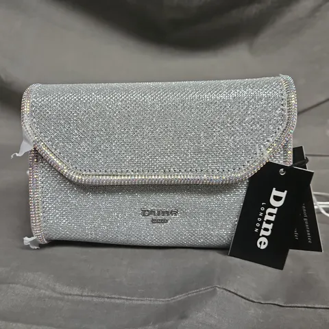 DUNE LONDON BORDER FOLDOVER CLUTCH IN SILVER METALLIC COLOUR