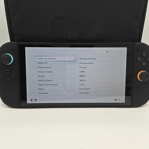 NINTENDO SWITCH 2 HANDHELD GAMES CONSOLE WITH ACCESSORIES AND ALL-IN-ONE CARRY CASE AND 1 GAME
