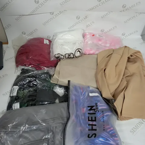 LARGE BOX OF ASSORTED CLOTHING ITEMS IN VARIOUS COLOURS AND SIZES INCLUDING TROUSERS , TOPS AND JUMPERS