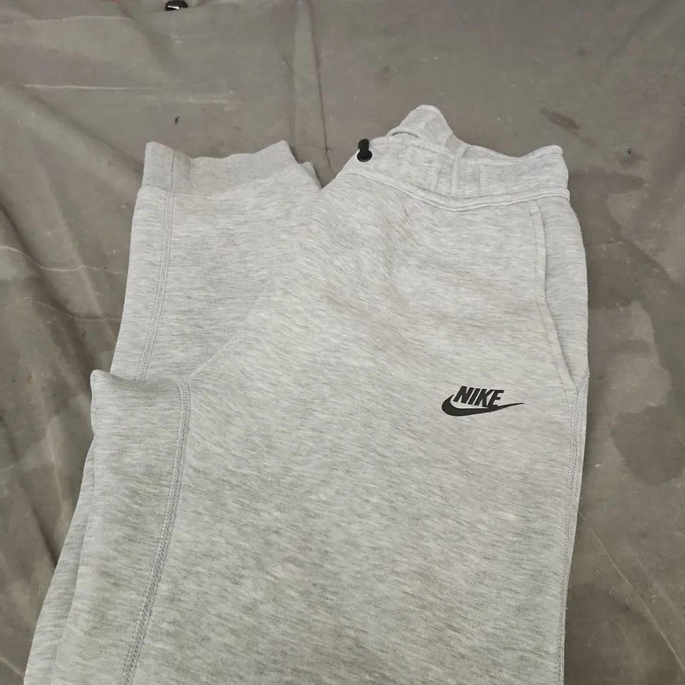 NIKE KIDS GREY JOGGERS WITH SWOOSH LOGO SIZE LARGE