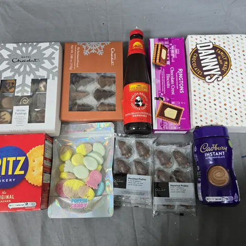 LOT OF APPROXIMATELY 20 ASSORTED FOOD ITEMS TO INCLUDE HOTEL CHOCOLAT TRAYS, OYSTER SAUCE AND POPPIN CANDY