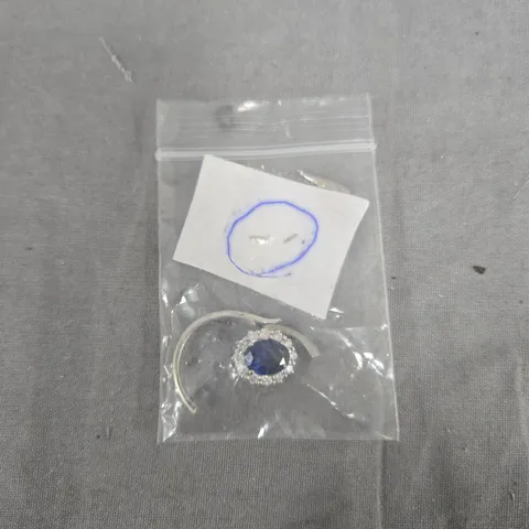 9CT WHITE GOLD RING WITH BLUE GEMSTONE AND DIAMOND HALO – CREATED BRILLIANCE