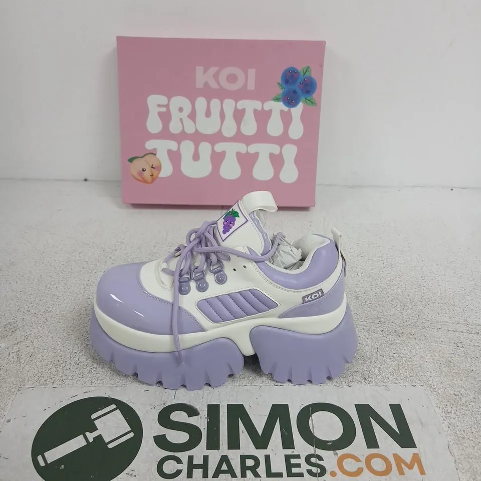 BOXED PAIR OF KOI FRUITTI TUTTI GRAPE JELLY TRAINERS IN PURPLE/WHITE SIZE UK 5