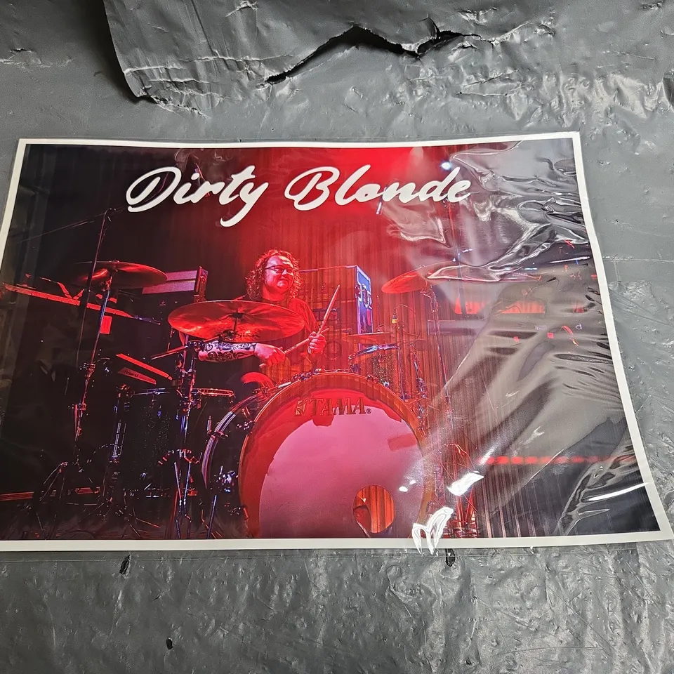 DIRTY BLONDE CONCERT PHOTOGRPH – DRUMMER ON STAGE (SIGNED ON REVERSE BY PAUL W DIXON)