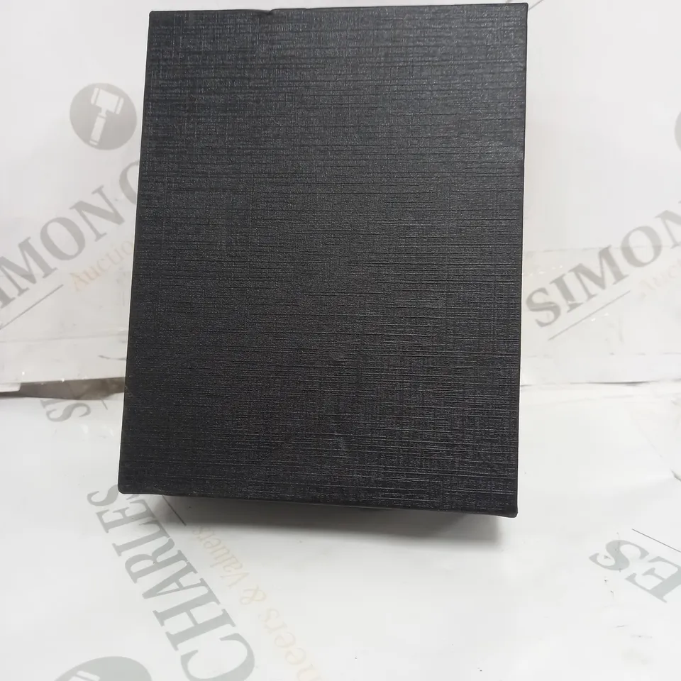 BOXED MALE SEX TOY WITH BUTTON 